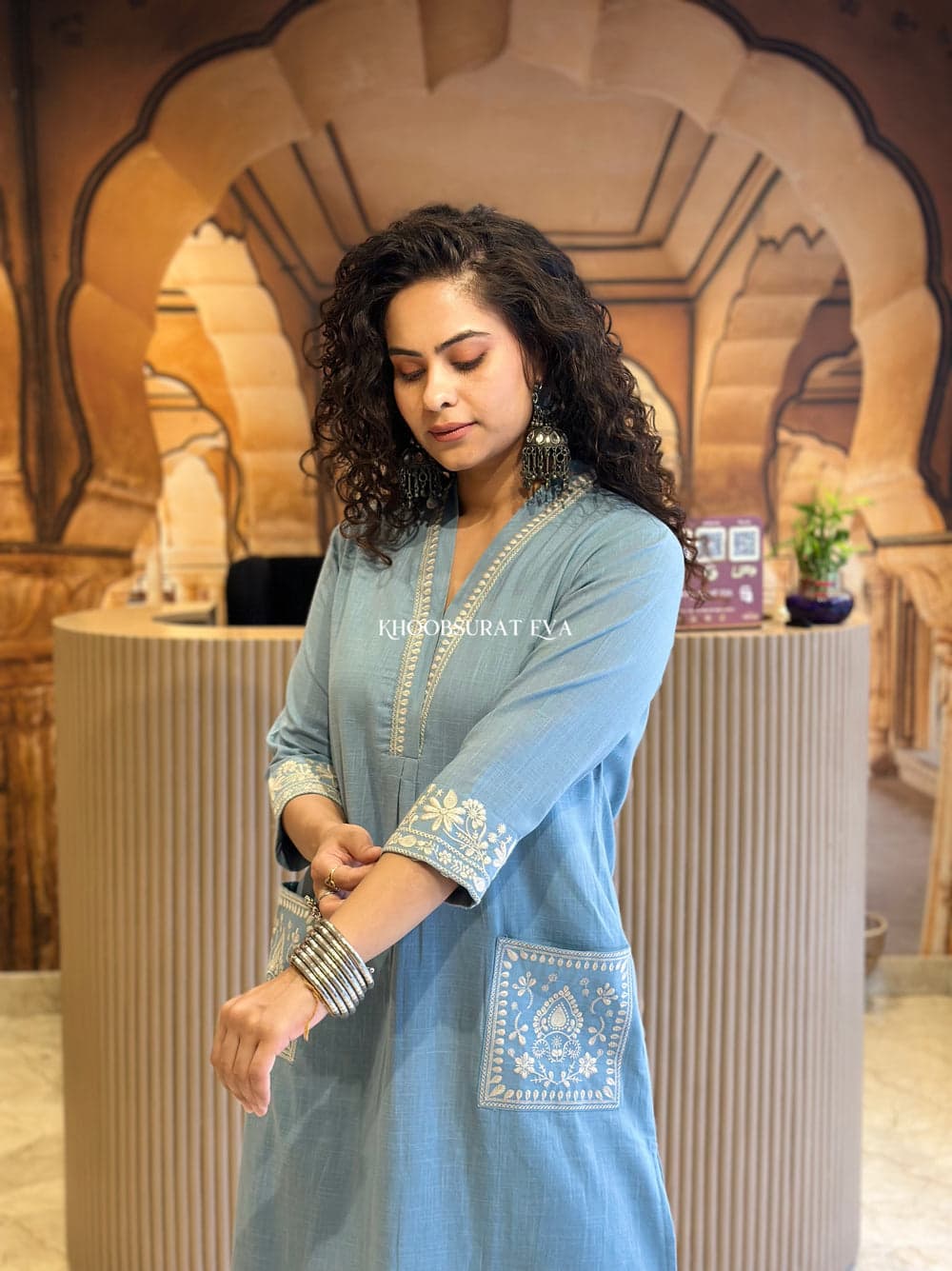 Grace in Blue: Timeless Elegance with Delicate Embroiderd